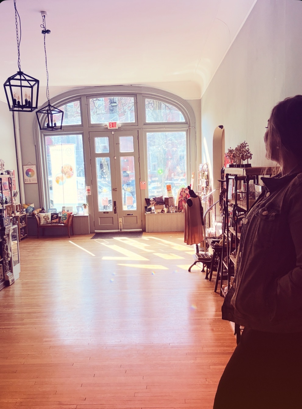 Marisa McFadden looking across the Creative Spirit storefront